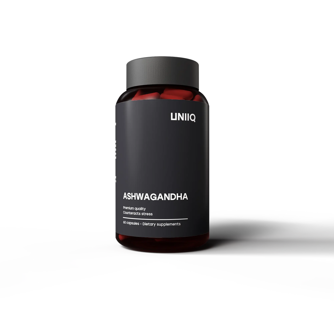 Black supplement bottle labeled 'ASHWAGANDHA' by 'UNIIQ' on transparent background