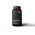 Black supplement bottle labeled 'ASHWAGANDHA' by 'UNIIQ' on transparent background